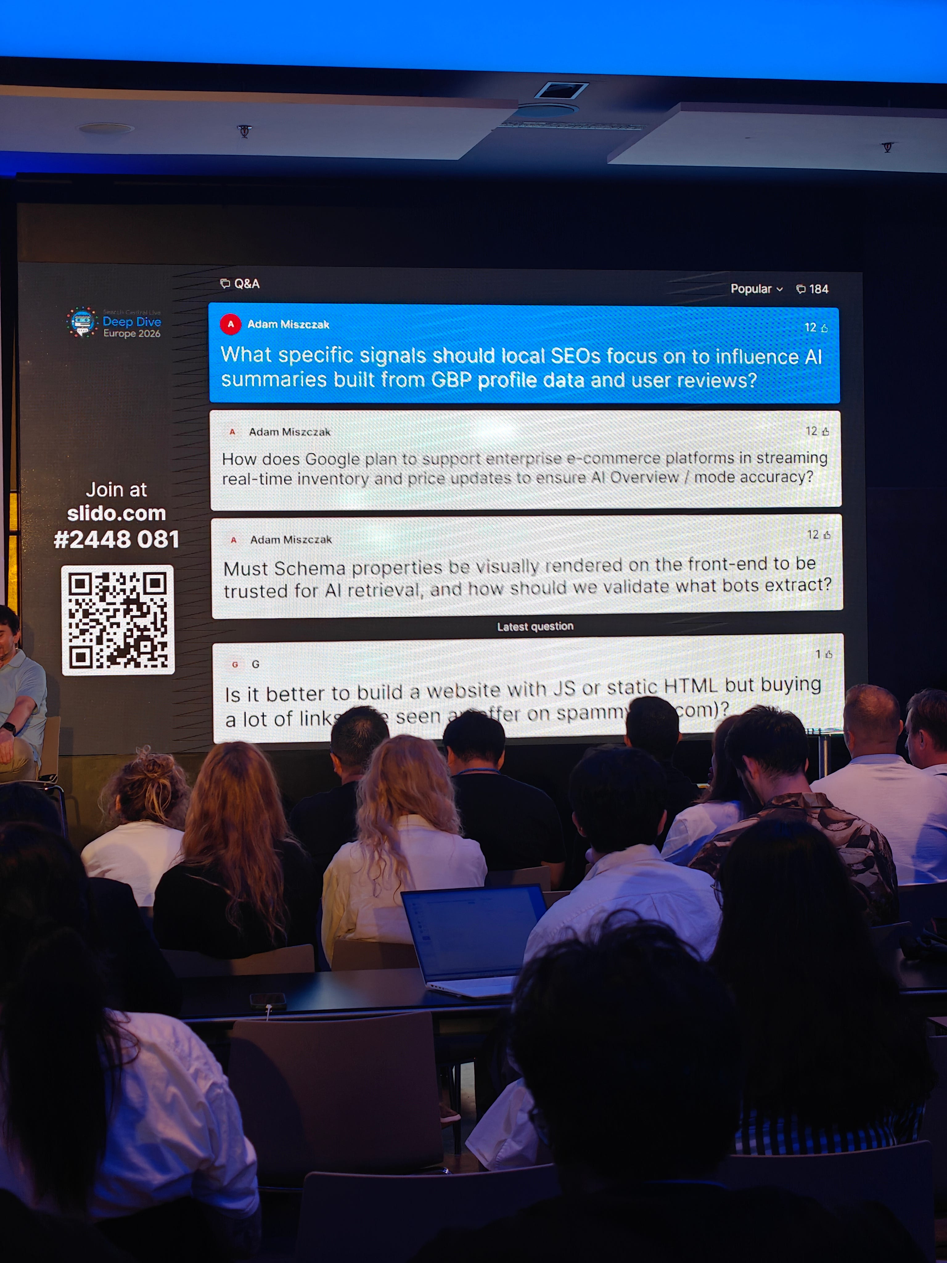 Slido screen at Google Search Central Live Deep Dive Europe 2026 in Barcelona showing questions about AI Search, local search and real-time e-commerce product data.